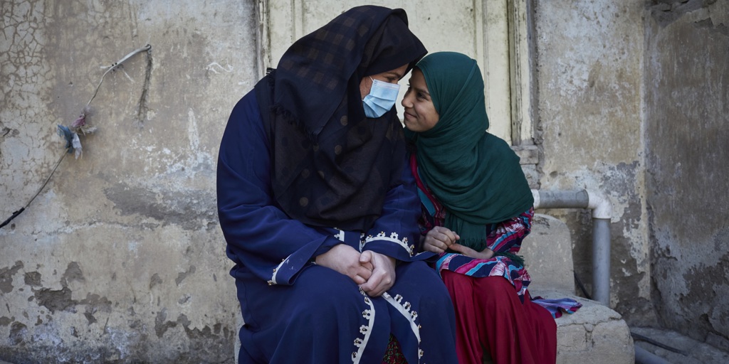Farishta*, a 28-year-old widow and mother of two, with her daughter in Kabul, Afghanistan.