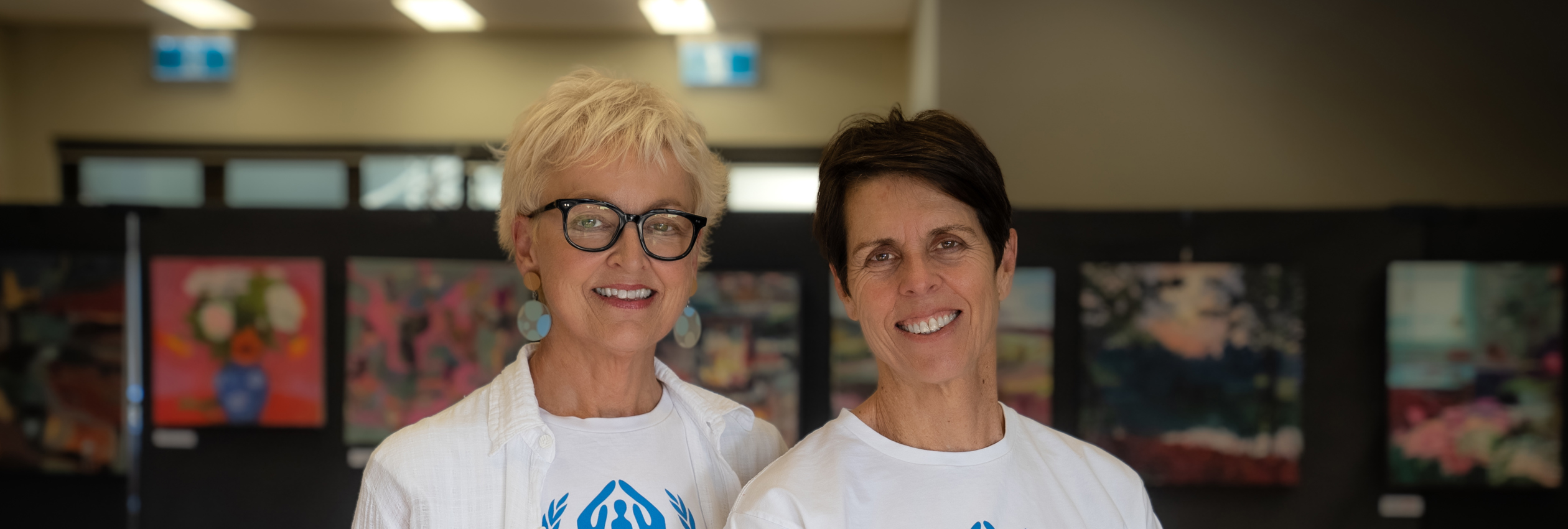 Fundraisers, Mary Lou and Therese wear UNHCR shirts