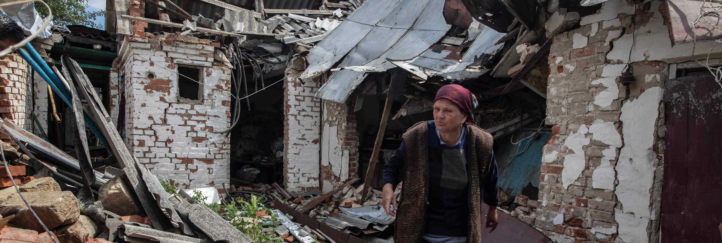 UNHCR High Commissioner for Refugees, Filippo Grandi, meets Liudmyla, 65, at her destroyed home in Makariv. ; More than 6.2 million people remain internally displaced by the war in Ukraine. Up to 20,000 civilians were evacuated in Kyiv Oblast, including from Irpin and Bucha districts.