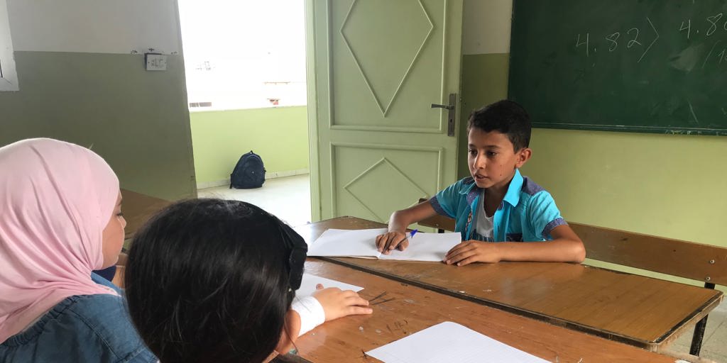 Twelve-year-old Abdel Razzaq Abdel Wahab from Syria tutors his classmates at Al Haydariya semi-private school in Sarafand, southern Lebanon.