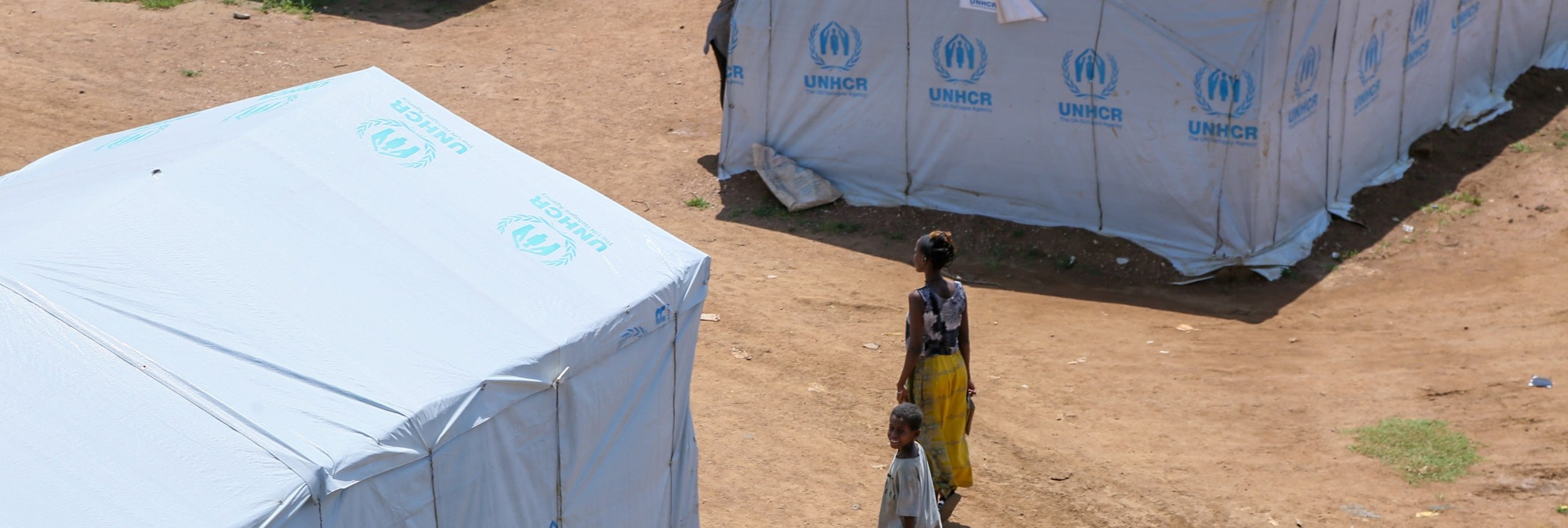 Families displaced by the ongoing conflict in the Tigray region find shelter in an IDP site called Five Angels in Shire where UNHCR has set up shelter to provide a roof to displaced families.