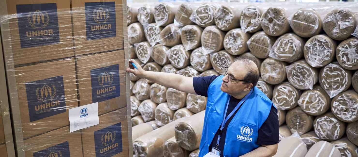 Senior Supply Officer, Nabil Makki, pictured in the UNHCR warehouse in Bucharest. Nabil came out of retirement to assist in the Ukraine crisis.