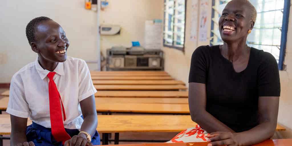 Nyadol Nyuon OAM meets with a student at Kakuma Secondary School in Kenya.