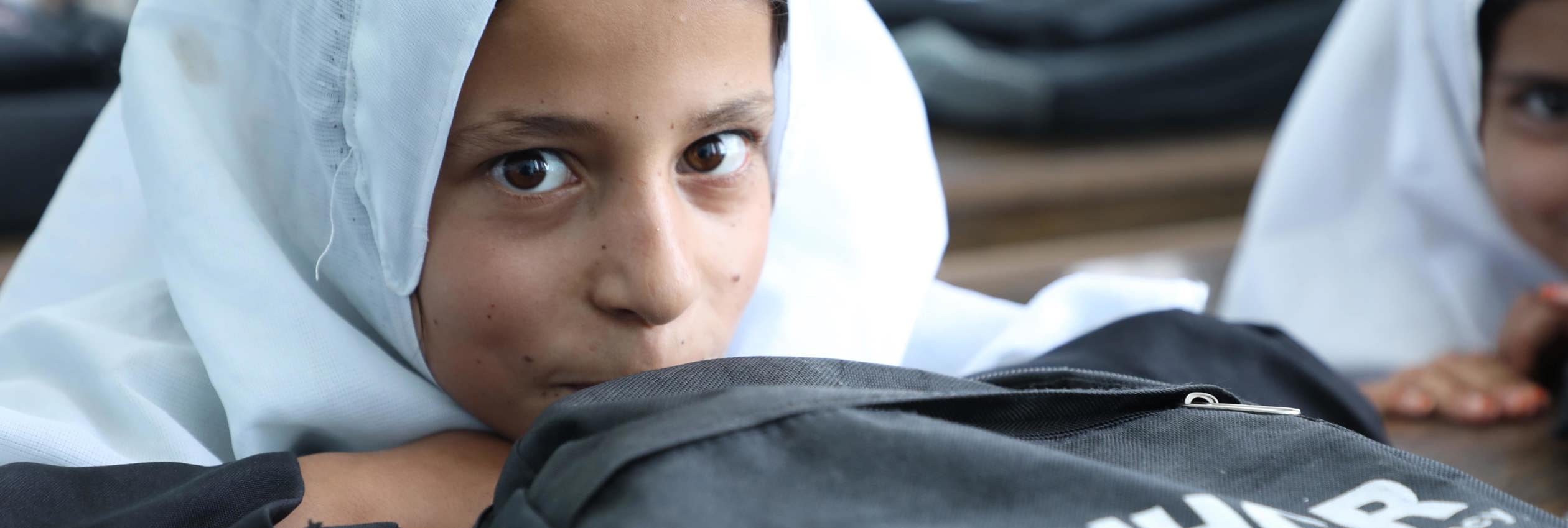 A student attends Kahdistan Primary School. The UNHCR-built school supports hundreds of girls from families who are internally displaced and refugee returnees in Herat Province. 
