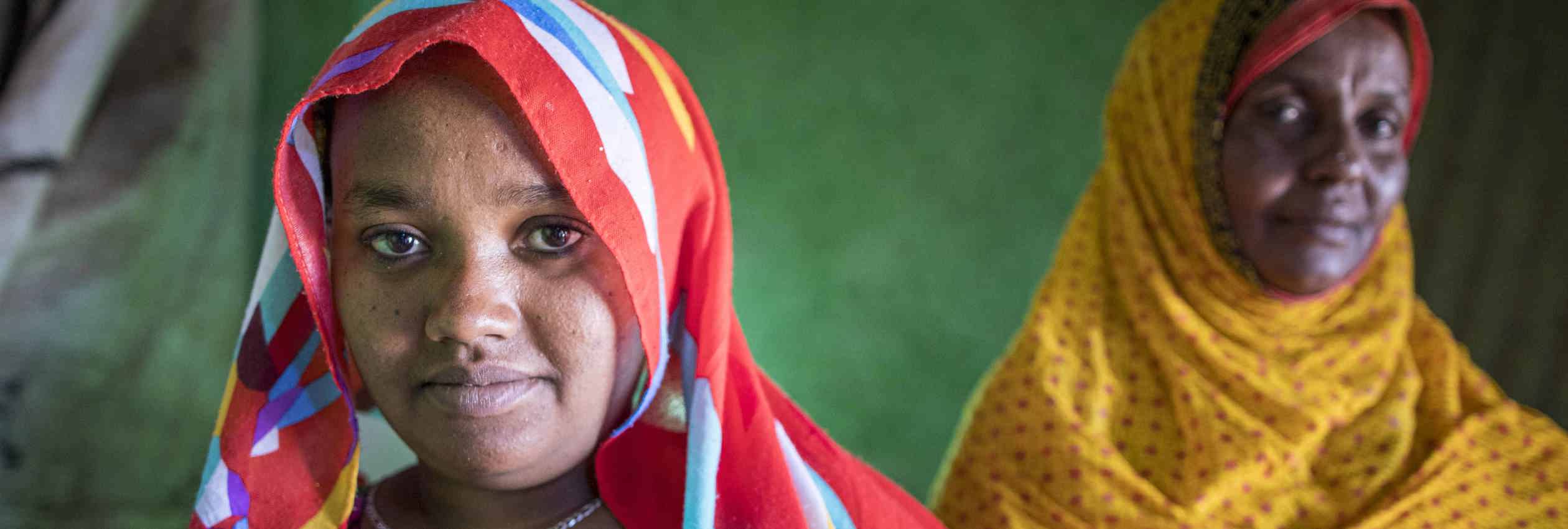 Eritrean refugee Hallima (in yellow), 45, and her daughter Dunya, 19, are photographed at Mai Aini camp in the Tigray region of Ethiopia, during a visit of UN High Commissioner for Refugees Filippo Grandi. 