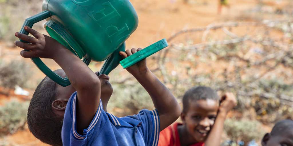 Young Noor drinks water. When violence struck Laascaanood, Somalia, Mohamed, Abdirisak and Noor Siyad Abdi (11, 10 and 3 respectively) were living with their uncle Hassan Abdi Ali, 36, and grandmother Dama Umal Yuusuf, 76. They were forced to flee to Ethiopia, leaving their mother and other siblings behind. 