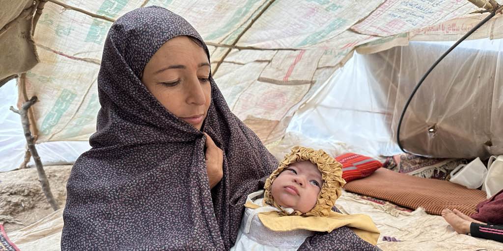 Humaira, a mother of eight, received a tent and emergency items from UNHCR and partners