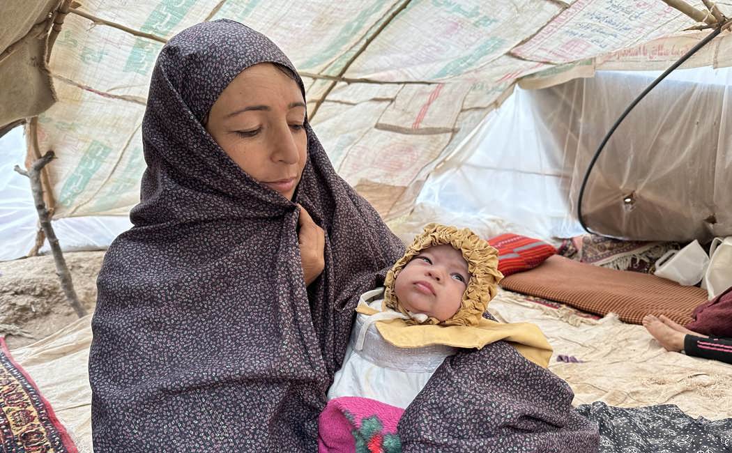 Humaira, a mother of eight, received a tent and emergency items from UNHCR and partners