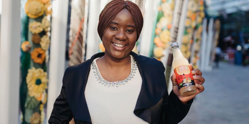 Yarrie Bangura holds her product, Aunty’s Ginger Tonic