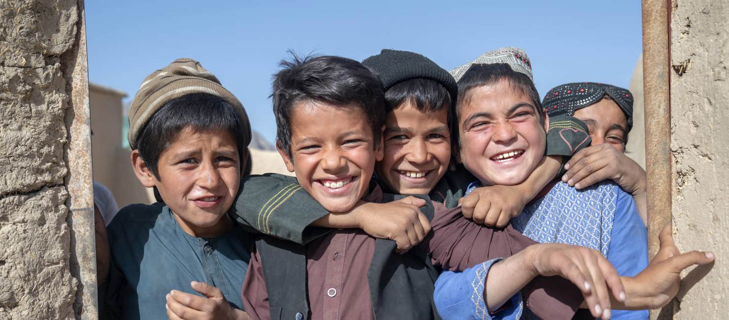 Children from internally displaced families play at a settlement for displaced people in Loya Wala north of Kandahar, Afghanistan.